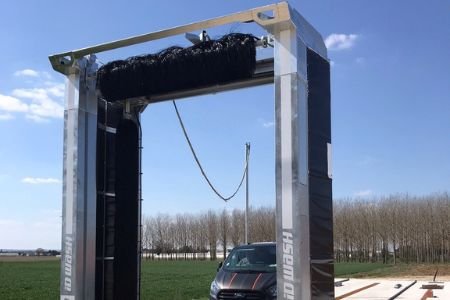 Portique de lavage poids lourds sur aire de lavage des transports De Nadai et fils